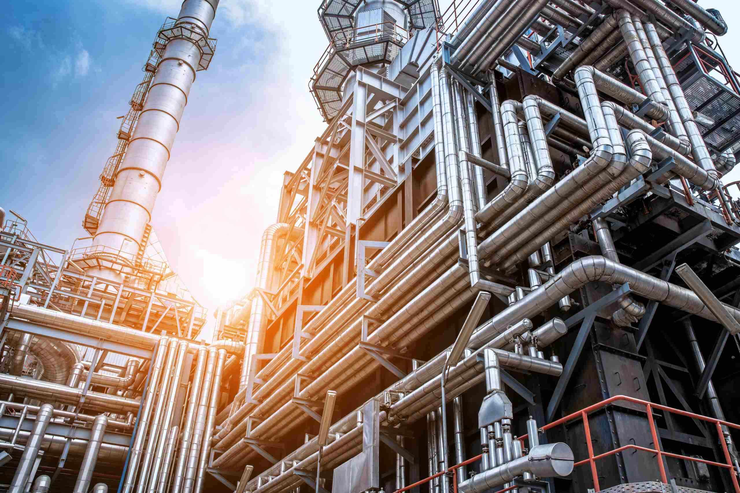 Close up Industrial view at oil refinery plant form industry zone with sunrise and cloudy sky